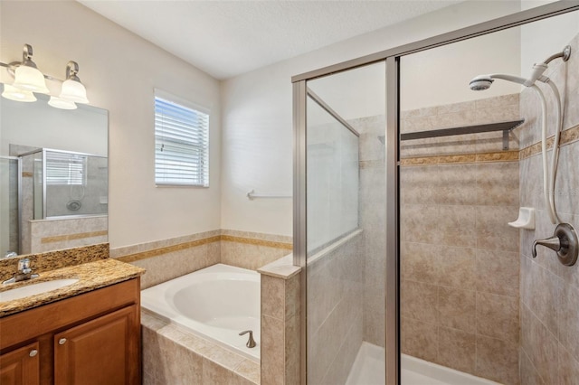 12831 White Bluff Rd, Hudson, FL 34669 - full bathroom with a stall shower, vanity, and a bath