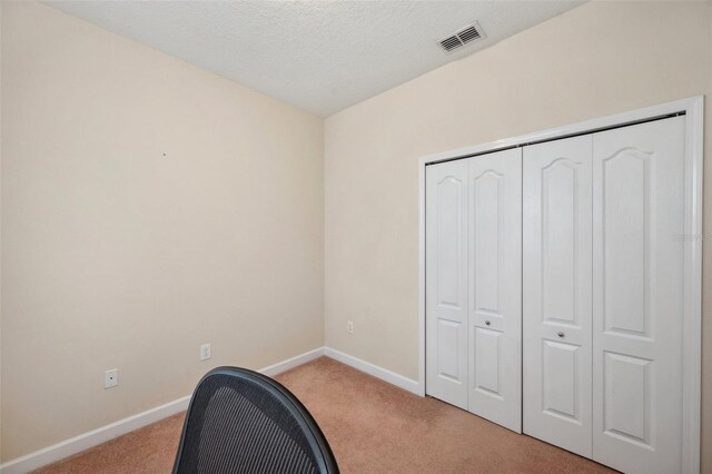 12831 White Bluff Rd, Hudson, FL 34669 - unfurnished office with light colored carpet and baseboards