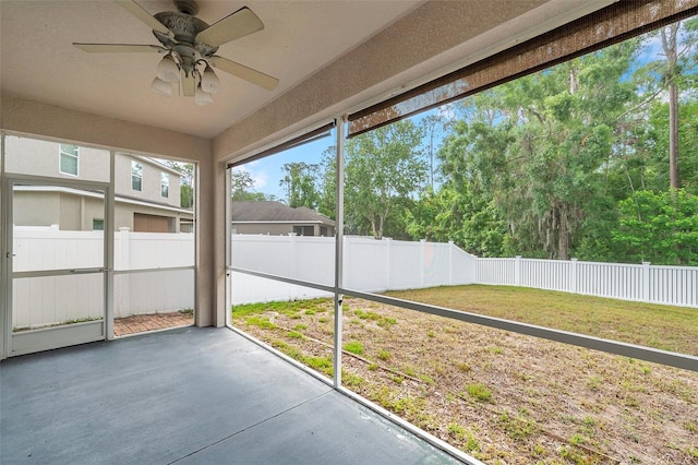 12831 White Bluff Rd, Hudson, FL 34669 - unfurnished sunroom with ceiling fan