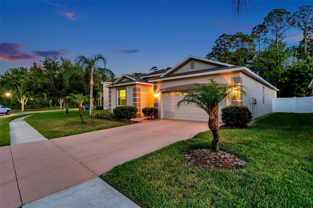 12831 White Bluff Rd, Hudson, FL 34669 - single story home featuring driveway, a garage, and stucco siding