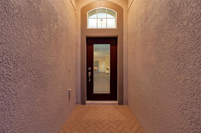 12831 White Bluff Rd, Hudson, FL 34669 - doorway to property with stucco siding