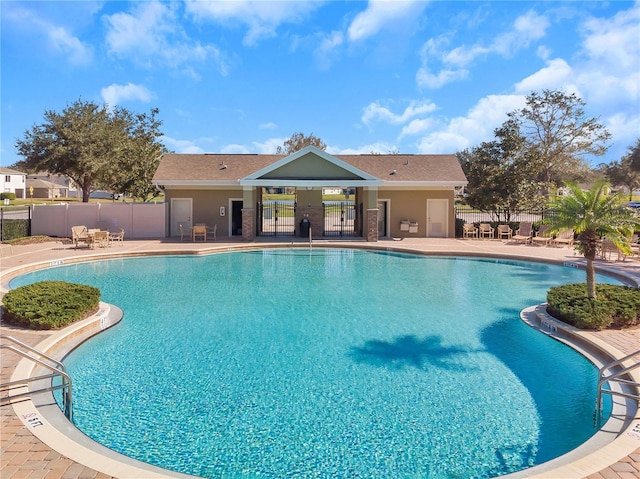 12831 White Bluff Rd, Hudson, FL 34669 - community pool with fence and a patio