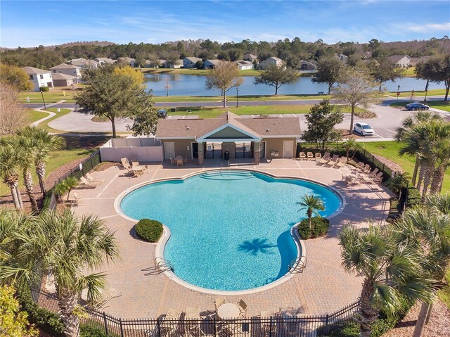 12831 White Bluff Rd, Hudson, FL 34669 - community pool with fence, a patio area, and a water view