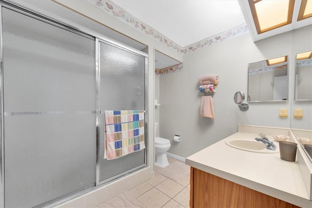 full bath featuring tile patterned flooring, toilet, a shower stall, and vanity