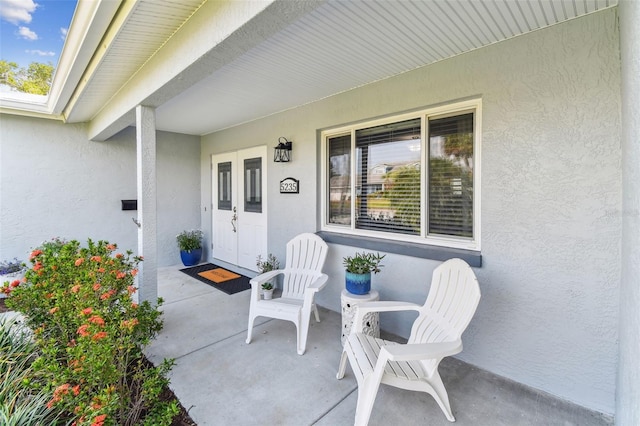 5235 42nd St S, Saint Petersburg, FL 33711 - view of patio featuring a porch