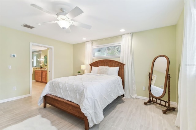 5235 42nd St S, Saint Petersburg, FL 33711 - bedroom featuring light wood-style floors, baseboards, a ceiling fan, ensuite bathroom, and recessed lighting