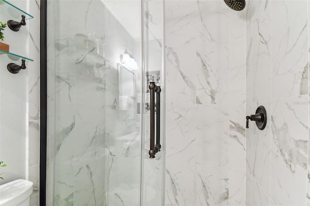 5235 42nd St S, Saint Petersburg, FL 33711 - full bathroom featuring a marble finish shower and toilet