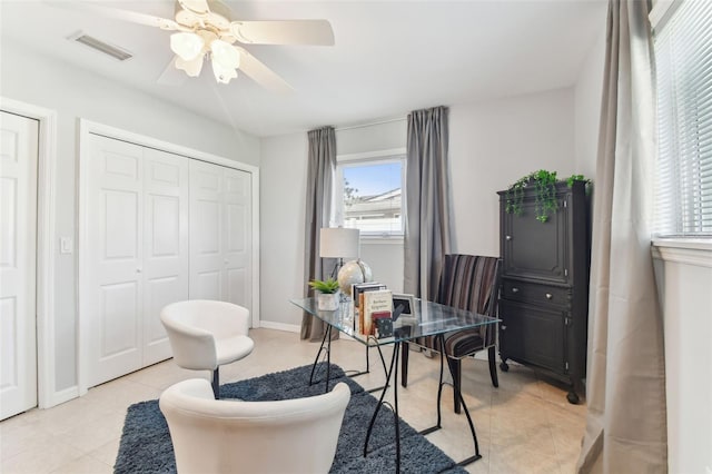 5235 42nd St S, Saint Petersburg, FL 33711 - office space with light tile patterned floors, a ceiling fan, and baseboards