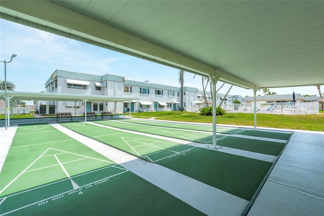 5356 81st St N Unit 26, Saint Petersburg, FL 33709 - surrounding community featuring a lawn and shuffleboard