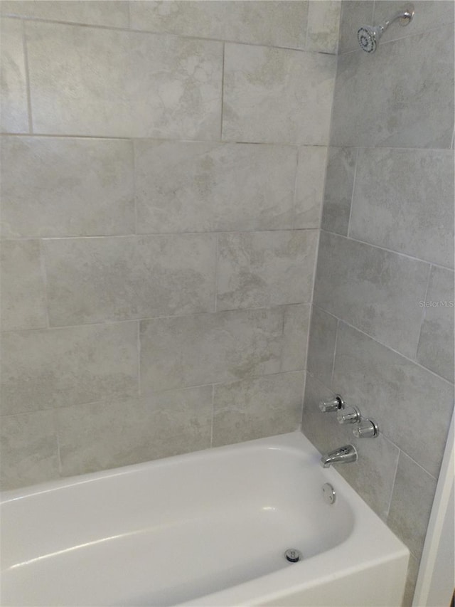 bathroom featuring tub / shower combination