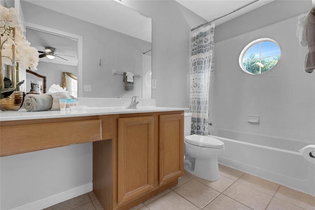 bathroom with a ceiling fan, tile patterned flooring, vanity, toilet, and shower / tub combo with curtain