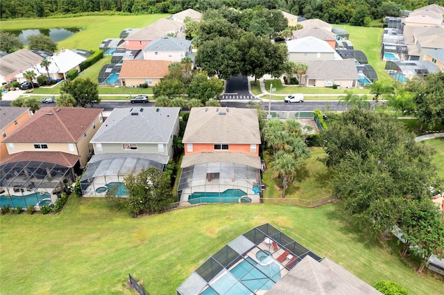 aerial view featuring a water view and a residential view