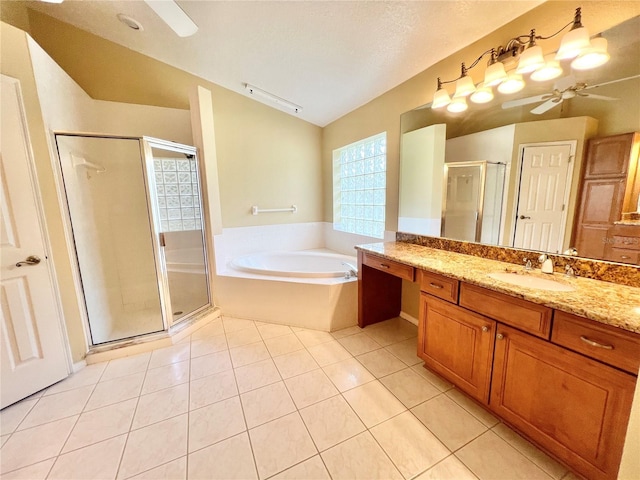 full bathroom featuring a garden tub, lofted ceiling, tile patterned floors, a ceiling fan, and a stall shower