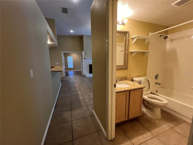 full bathroom featuring tile patterned floors, vanity, toilet, and visible vents