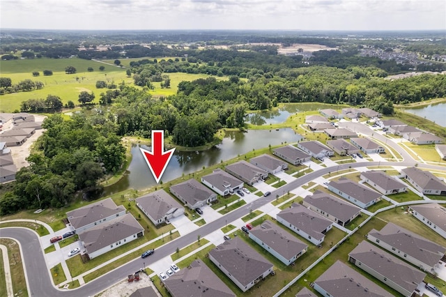 aerial view featuring a residential view and a water view