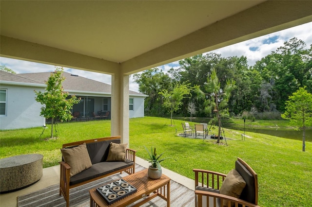view of patio / terrace featuring a water view and an outdoor hangout area