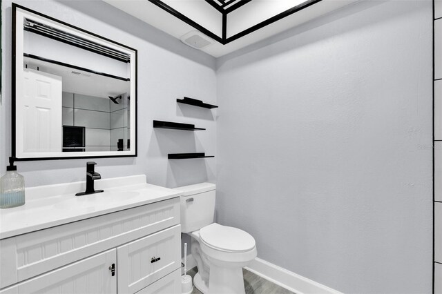 1913 Poinsetta Ln, Maitland, FL 32751 - full bath with toilet, vanity, baseboards, a shower, and wood finished floors