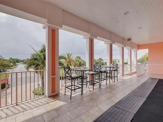 view of patio / terrace with a balcony