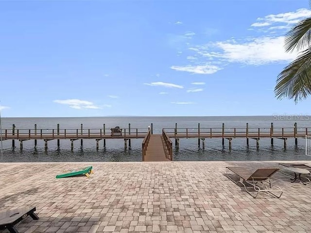 dock area featuring a water view