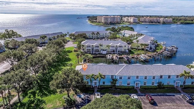drone / aerial view with a water view