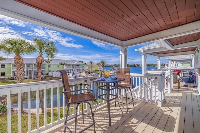 deck featuring a water view