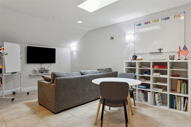 3906 Floyd Rd, Tampa, FL 33618 - living room with a skylight, tile patterned floors, vaulted ceiling, and recessed lighting