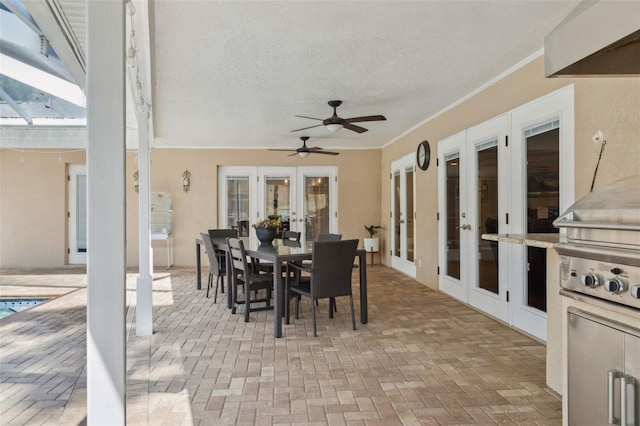 3906 Floyd Rd, Tampa, FL 33618 - view of patio with french doors, ceiling fan, and outdoor dining area