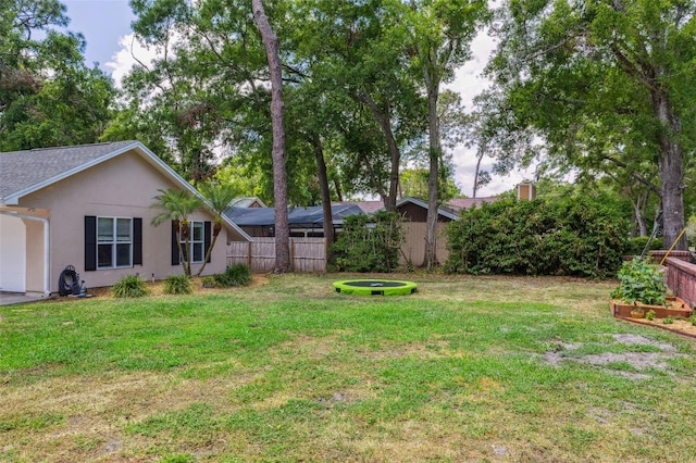 3906 Floyd Rd, Tampa, FL 33618 - view of yard featuring a vegetable garden