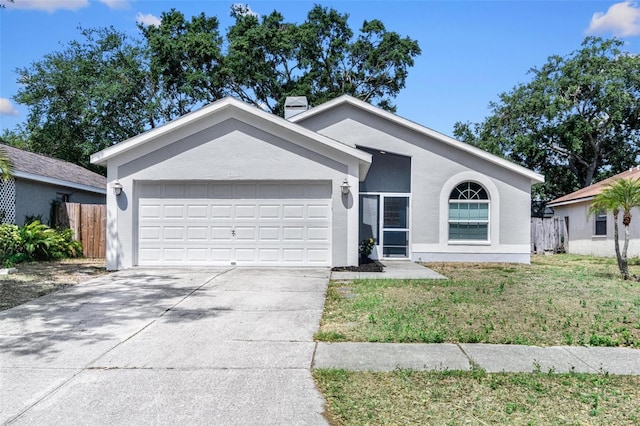 13613 Laraway Dr, Riverview, FL 33579 - ranch-style house with a garage, concrete driveway, stucco siding, and a chimney