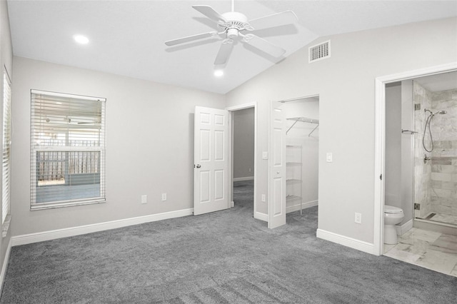 13613 Laraway Dr, Riverview, FL 33579 - unfurnished bedroom with a spacious closet, vaulted ceiling, baseboards, ensuite bath, and recessed lighting
