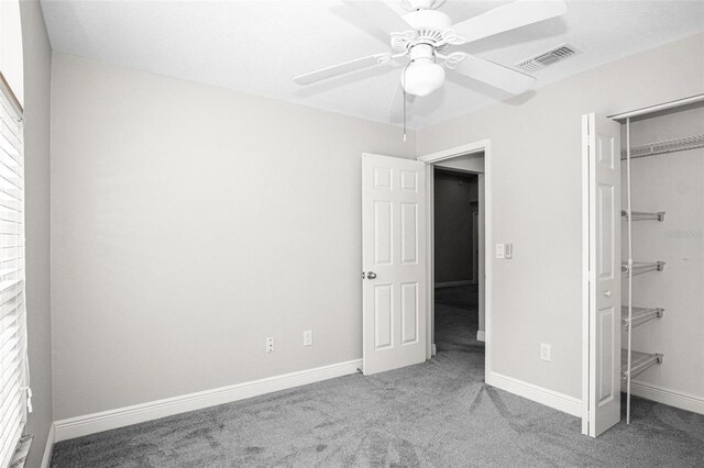 13613 Laraway Dr, Riverview, FL 33579 - unfurnished bedroom featuring carpet floors, a closet, baseboards, and ceiling fan