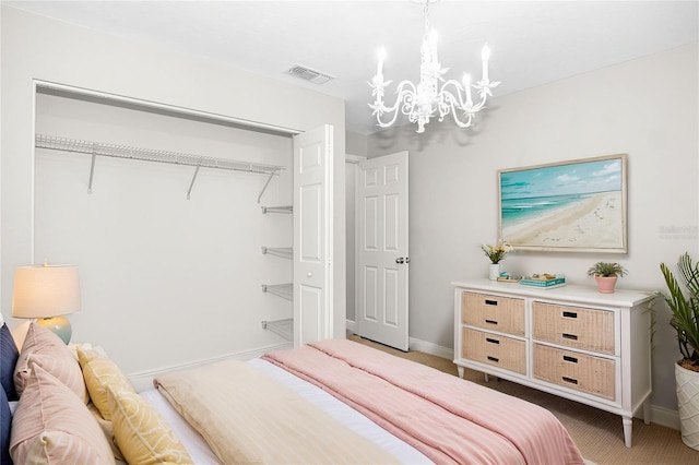 13613 Laraway Dr, Riverview, FL 33579 - bedroom featuring a chandelier, baseboards, carpet, and a closet