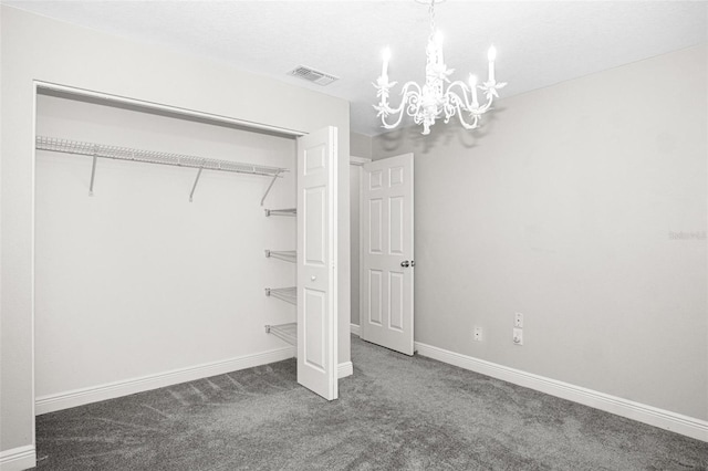 13613 Laraway Dr, Riverview, FL 33579 - unfurnished bedroom featuring a chandelier, carpet flooring, a closet, and baseboards