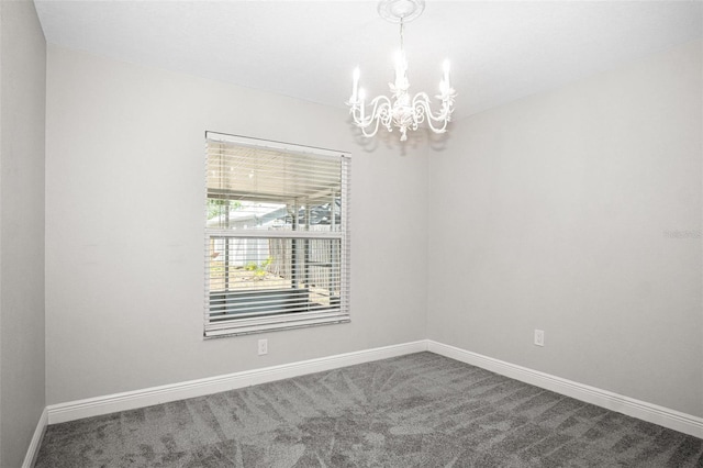 13613 Laraway Dr, Riverview, FL 33579 - carpeted empty room featuring a chandelier and baseboards