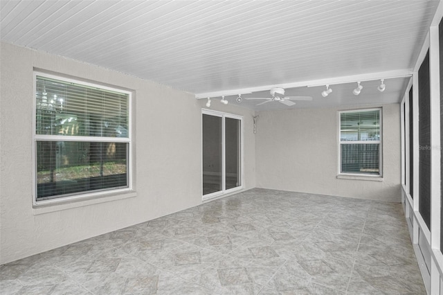 13613 Laraway Dr, Riverview, FL 33579 - empty room featuring track lighting and ceiling fan