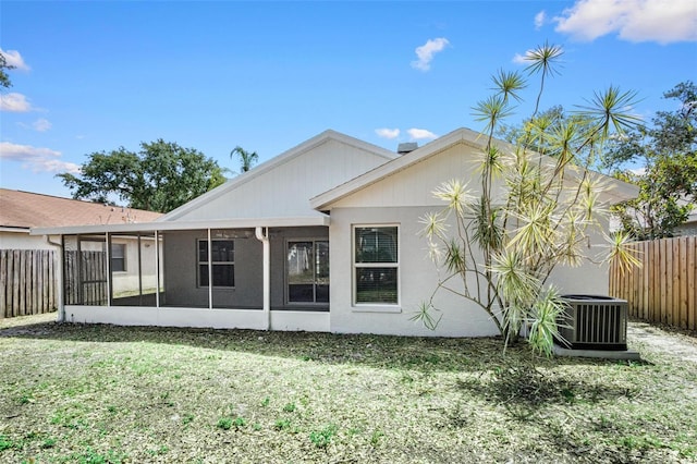 13613 Laraway Dr, Riverview, FL 33579 - rear view of house featuring a sunroom and cooling unit
