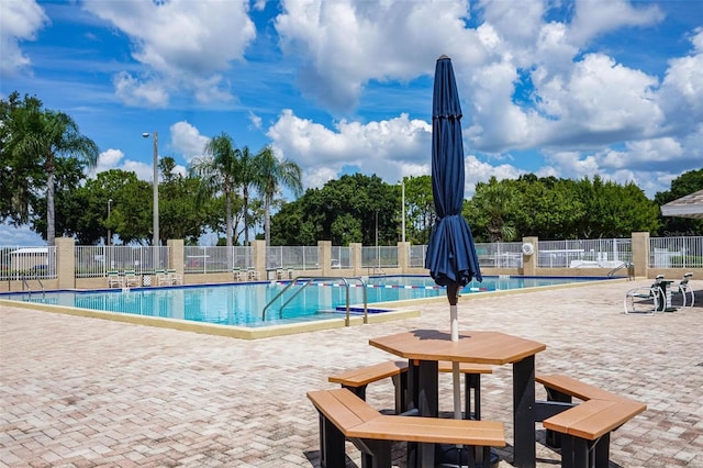 13613 Laraway Dr, Riverview, FL 33579 - community pool featuring fence and a patio area
