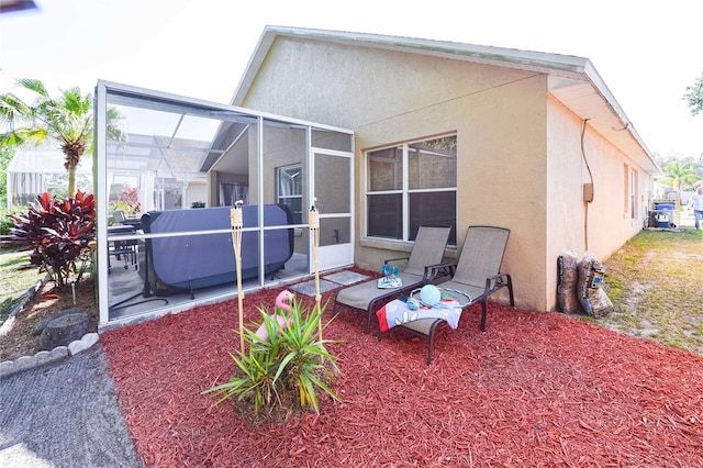 2604 Clareside Dr, Valrico, FL 33596 - back of house featuring stucco siding, a lanai, and a patio