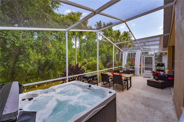 2604 Clareside Dr, Valrico, FL 33596 - view of patio featuring a hot tub, glass enclosure, outdoor dining space, and grilling area