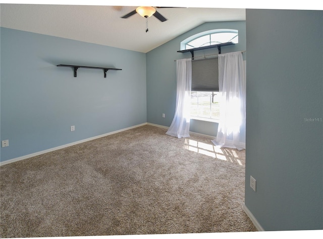 2604 Clareside Dr, Valrico, FL 33596 - unfurnished room featuring ceiling fan, vaulted ceiling, carpet flooring, and plenty of natural light