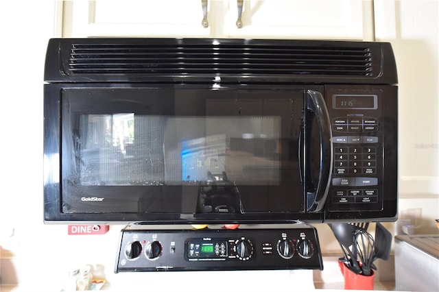 2604 Clareside Dr, Valrico, FL 33596 - kitchen view of black microwave and stove