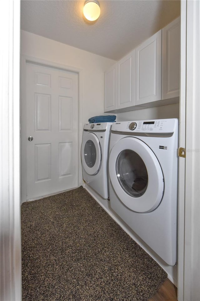 2604 Clareside Dr, Valrico, FL 33596 - clothes washing area featuring separate washer and dryer and cabinet space