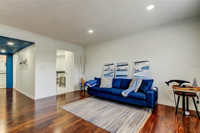 1115 Rue Des Chateaux Unit 2B, South Pasadena, FL 33707 - living area featuring crown molding, baseboards, and wood finished floors