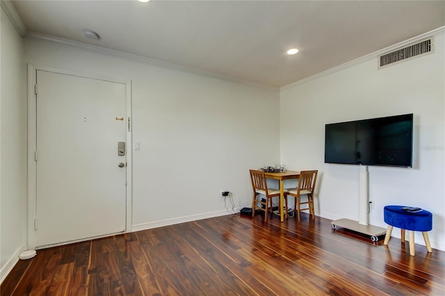 1115 Rue Des Chateaux Unit 2B, South Pasadena, FL 33707 - entrance foyer featuring crown molding, wood finished floors, and visible vents