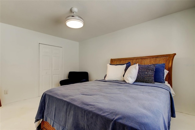 1115 Rue Des Chateaux Unit 2B, South Pasadena, FL 33707 - carpeted bedroom featuring a closet