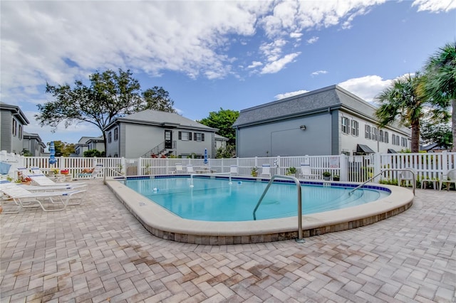 1115 Rue Des Chateaux Unit 2B, South Pasadena, FL 33707 - pool featuring fence and a patio area
