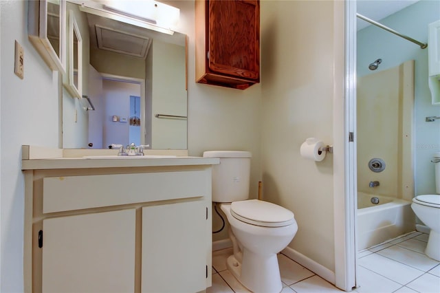 6428 Gloria Dr Unit 21, New Port Richey, FL 34653 - bathroom with vanity, toilet, tile patterned floors, baseboards, and  shower combination
