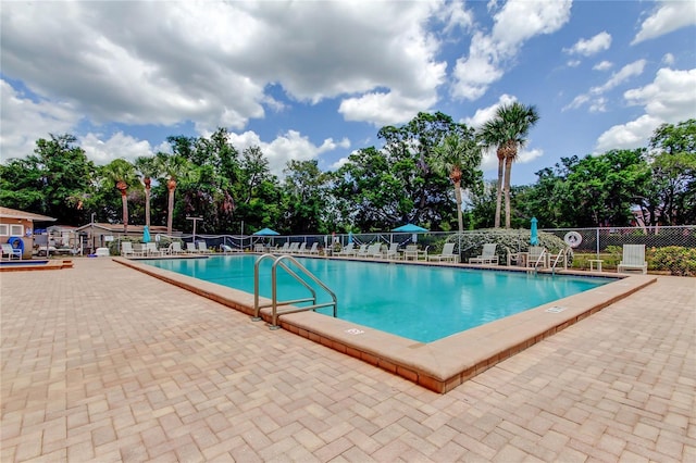 6428 Gloria Dr Unit 21, New Port Richey, FL 34653 - pool with fence and a patio