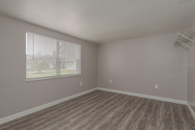 3601 Grayton Dr, New Port Richey, FL 34652 - unfurnished room featuring wood finished floors and baseboards