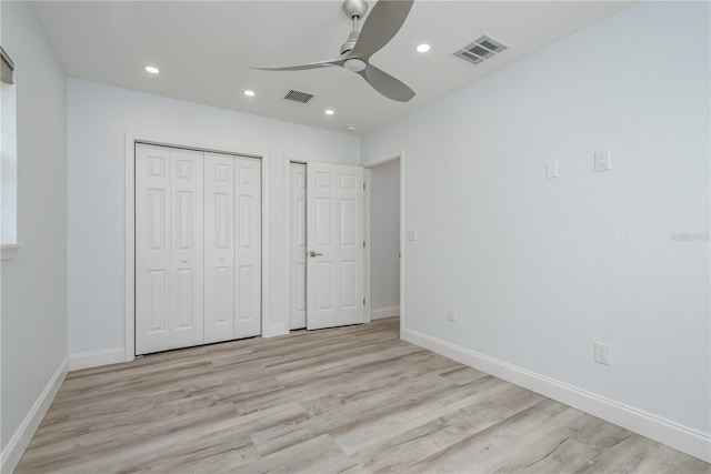 1152 Jackmar Rd, Dunedin, FL 34698 - unfurnished bedroom with light wood-style flooring, baseboards, recessed lighting, and a ceiling fan